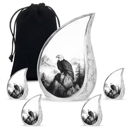Sterling Silver Eagle Cremation Urn side profile showing urn shape - flowing teardrop eagle silhouette on curved aluminum - memorial set with one large and four small urns