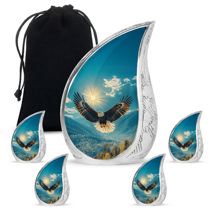 Sea Green Teal Eagle Cremation Urn side profile showing urn shape - flowing teardrop eagle silhouette on curved aluminum - memorial set with one large and four small urns