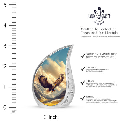 Cornflower Blue Eagle Cremation Urn angled view of lid and engraved motif - graceful tear-shaped urn with eagle motif - mini keepsake memorial for portion of cremation ashes
