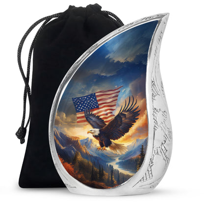 Azure Eagle Cremation Urn front view showing detailed design - flowing teardrop eagle silhouette on curved aluminum - full-size 10 inch 200 cubic inch adult cremation urn