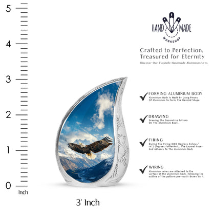 Twilight Blue Eagle Cremation Urn angled view of lid and engraved motif - smooth teardrop contour featuring eagle art - mini keepsake memorial for portion of cremation ashes