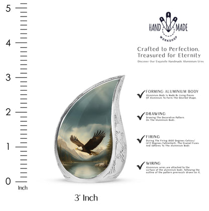 Midnight Black Eagle Cremation Urn angled view of lid and engraved motif - graceful tear-shaped urn with eagle motif - mini keepsake memorial for portion of cremation ashes