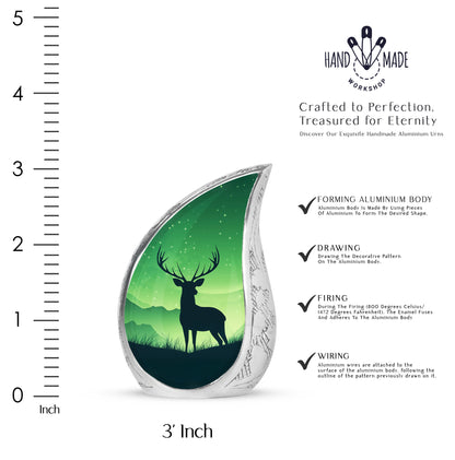 Forest Green Deer Cremation Urn angled view of lid and engraved motif - smooth teardrop contour featuring deer art - mini keepsake memorial for portion of cremation ashes