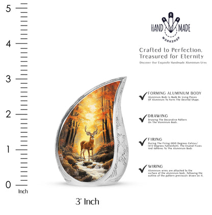 Warm Gold Deer Cremation Urn angled view of lid and engraved motif - smooth teardrop contour featuring deer art - mini keepsake memorial for portion of cremation ashes