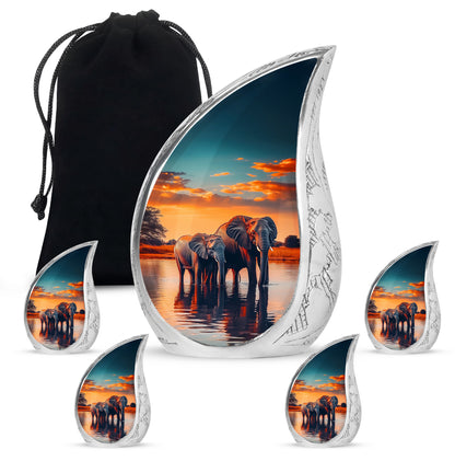 Jewel Teal Elephant Cremation Urn side profile showing urn shape - flowing teardrop elephant silhouette on curved aluminum - memorial set with one large and four small urns
