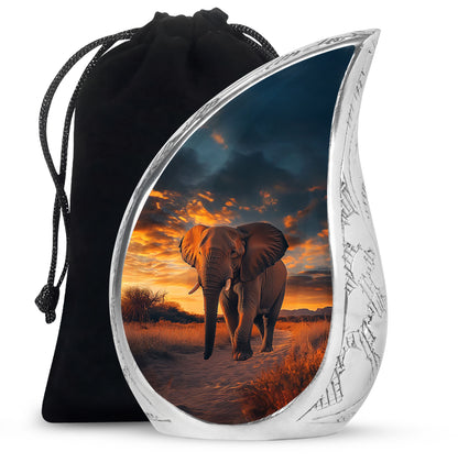 Ebony Elephant Cremation Urn front view showing detailed design - flowing teardrop elephant silhouette on curved aluminum - full-size 10 inch 200 cubic inch adult cremation urn