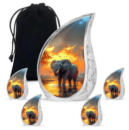Sunrise Gold Elephant Cremation Urn side profile showing urn shape - flowing teardrop elephant silhouette on curved aluminum - memorial set with one large and four small urns