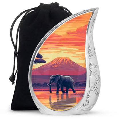 Amber Gold Elephant Cremation Urn front view showing detailed design - flowing teardrop elephant silhouette on curved aluminum - full-size 10 inch 200 cubic inch adult cremation urn