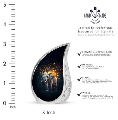 Deep Black Elephant Cremation Urn angled view of lid and engraved motif - flowing teardrop elephant silhouette on curved aluminum - mini keepsake memorial for portion of cremation ashes
