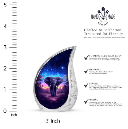 Navy Blue Elephant Cremation Urn angled view of lid and engraved motif - flowing teardrop elephant silhouette on curved aluminum - mini keepsake memorial for portion of cremation ashes