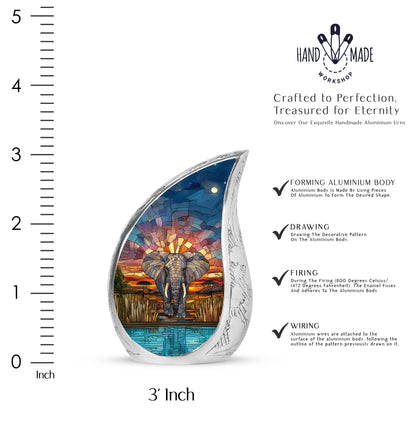 Antique Gold Elephant Cremation Urn angled view of lid and engraved motif - flowing teardrop elephant silhouette on curved aluminum - mini keepsake memorial for portion of cremation ashes