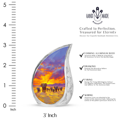 Vivid Blue Elephant Cremation Urn angled view of lid and engraved motif - smooth teardrop contour featuring elephant art - mini keepsake memorial for portion of cremation ashes
