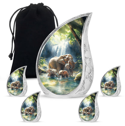 Vivid Blue Elephant Cremation Urn side profile showing urn shape - graceful tear-shaped urn with elephant motif - memorial set with one large and four small urns