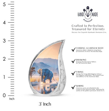 Azure Elephant Cremation Urn angled view of lid and engraved motif - rounded teardrop elephant design with delicate detail - mini keepsake memorial for portion of cremation ashes