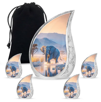 Slate Blue Elephant Cremation Urn side profile showing urn shape - flowing teardrop elephant silhouette on curved aluminum - memorial set with one large and four small urns