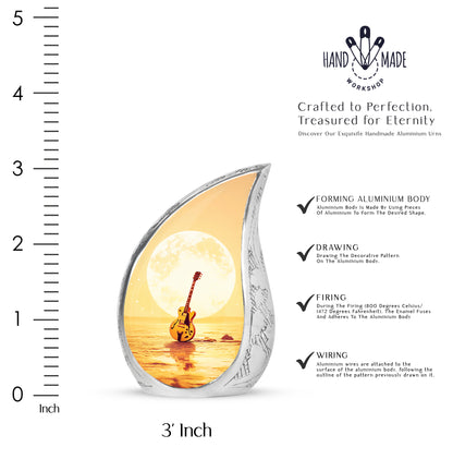 Royal Gold Guitar Cremation Urn angled view of lid and engraved motif - smooth teardrop contour featuring guitar art - mini keepsake memorial for portion of cremation ashes