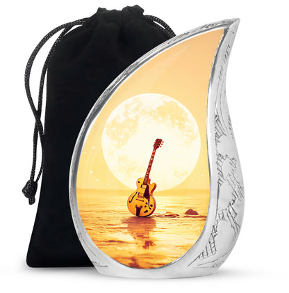 Sunrise Gold Guitar Cremation Urn front view showing detailed design - flowing teardrop guitar silhouette on curved aluminum - full-size 10 inch 200 cubic inch adult cremation urn
