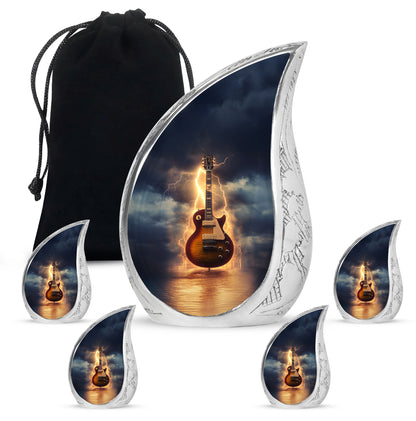 Pastel Blue Guitar Cremation Urn side profile showing urn shape - rounded teardrop guitar design with delicate detail - memorial set with one large and four small urns