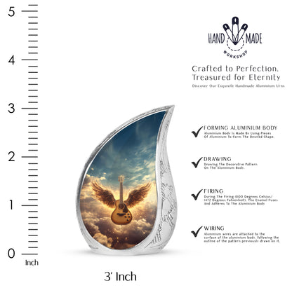 Steel Blue Guitar Cremation Urn angled view of lid and engraved motif - graceful tear-shaped urn with guitar motif - mini keepsake memorial for portion of cremation ashes