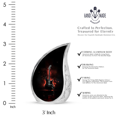 Onyx Black Guitar Cremation Urn angled view of lid and engraved motif - graceful tear-shaped urn with guitar motif - mini keepsake memorial for portion of cremation ashes