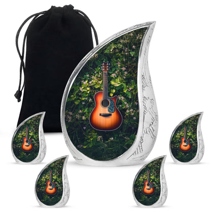 Emerald Green Guitar Cremation Urn side profile showing urn shape - flowing teardrop guitar silhouette on curved aluminum - memorial set with one large and four small urns
