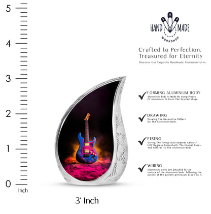 Dark Black Guitar Cremation Urn angled view of lid and engraved motif - smooth teardrop contour featuring guitar art - mini keepsake memorial for portion of cremation ashes