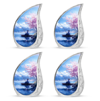 Pastel Blue Fishing Cremation Urn close-up of engraving and surface detail - flowing teardrop fishing silhouette on curved aluminum - 10 inch aluminum urn for cremated remains