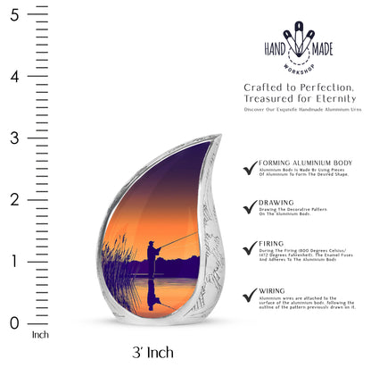 Harvest Gold Fishing Cremation Urn angled view of lid and engraved motif - smooth teardrop contour featuring fishing art - mini keepsake memorial for portion of cremation ashes