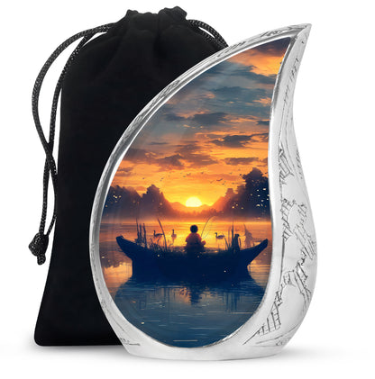 Gilded Gold Fishing Cremation Urn front view showing detailed design - flowing teardrop fishing silhouette on curved aluminum - full-size 10 inch 200 cubic inch adult cremation urn