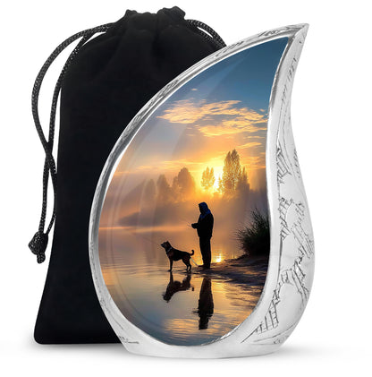 Celestial Blue Fishing Cremation Urn front view showing detailed design - flowing teardrop fishing silhouette on curved aluminum - full-size 10 inch 200 cubic inch adult cremation urn