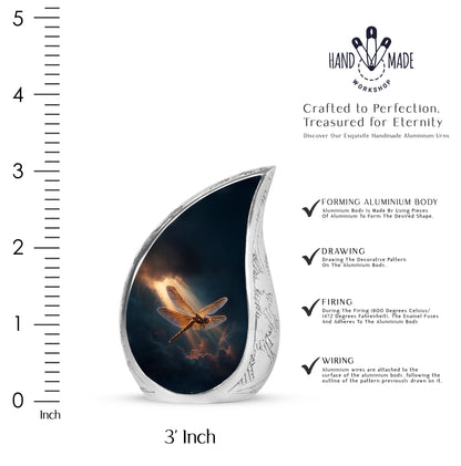 Sapphire Blue Dragonfly Cremation Urn angled view of lid and engraved motif - graceful tear-shaped urn with dragonfly motif - mini keepsake memorial for portion of cremation ashes