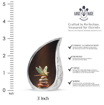 Garnet Red Dragonfly Cremation Urn angled view of lid and engraved motif - flowing teardrop dragonfly silhouette on curved aluminum - mini keepsake memorial for portion of cremation ashes