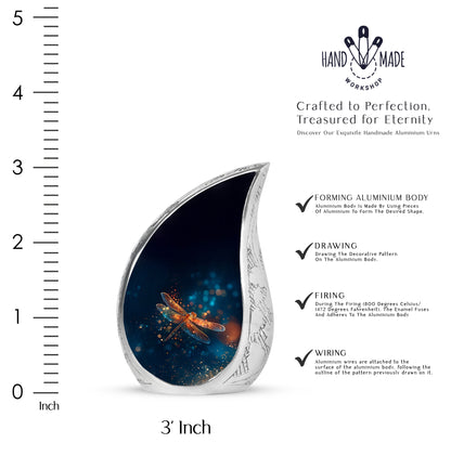 Soft Blue Dragonfly Cremation Urn angled view of lid and engraved motif - graceful tear-shaped urn with dragonfly motif - mini keepsake memorial for portion of cremation ashes