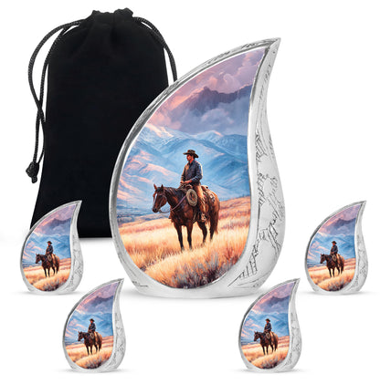 Powder Blue Cowboy Cremation Urn side profile showing urn shape - flowing teardrop cowboy silhouette on curved aluminum - memorial set with one large and four small urns