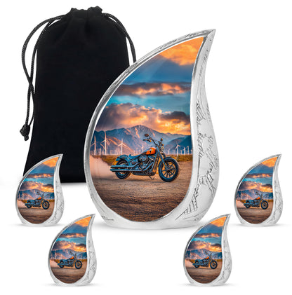 Deep Teal Bike Cremation Urn side profile showing urn shape - smooth teardrop contour featuring bike art - memorial set with one large and four small urns