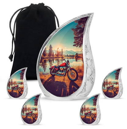 Harvest Gold Bike Cremation Urn side profile showing urn shape - smooth teardrop contour featuring bike art - memorial set with one large and four small urns