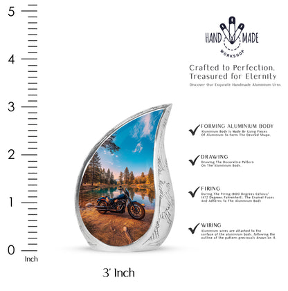 Sea Green Teal Bike Cremation Urn angled view of lid and engraved motif - rounded teardrop bike design with delicate detail - mini keepsake memorial for portion of cremation ashes