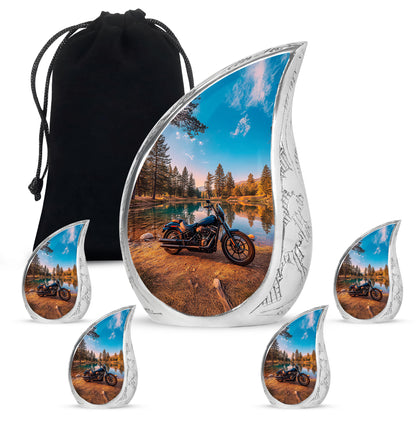 Deep Teal Bike Cremation Urn side profile showing urn shape - graceful tear-shaped urn with bike motif - memorial set with one large and four small urns