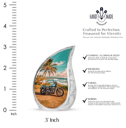 Tropical Teal Bike Cremation Urn angled view of lid and engraved motif - smooth teardrop contour featuring bike art - mini keepsake memorial for portion of cremation ashes
