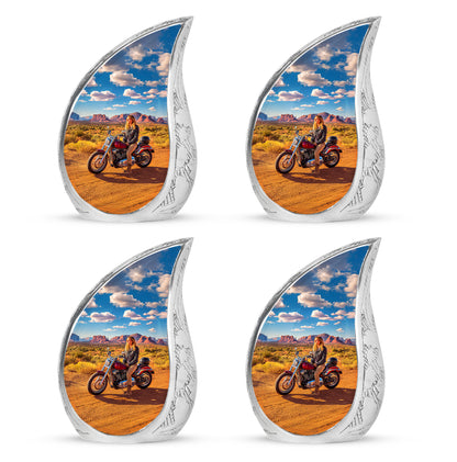 Soft Blue Bike Cremation Urn close-up of engraving and surface detail - graceful tear-shaped urn with bike motif - 10 inch aluminum urn for cremated remains