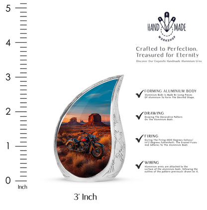 Celestial Blue Bike Cremation Urn angled view of lid and engraved motif - rounded teardrop bike design with delicate detail - mini keepsake memorial for portion of cremation ashes