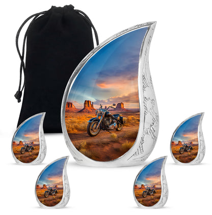 Serene Blue Bike Cremation Urn side profile showing urn shape - graceful tear-shaped urn with bike motif - memorial set with one large and four small urns