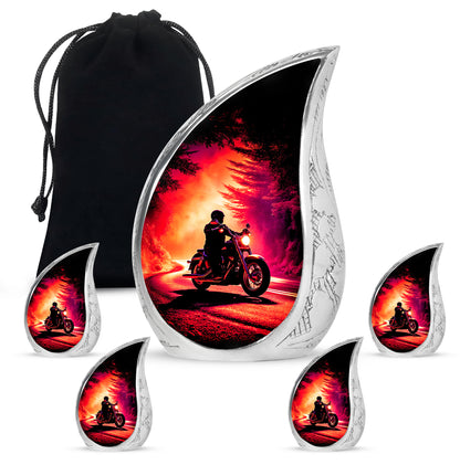 Deep Black Bike Cremation Urn side profile showing urn shape - rounded teardrop bike design with delicate detail - memorial set with one large and four small urns