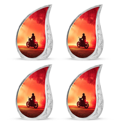 Cherry Red Bike Cremation Urn close-up of engraving and surface detail - graceful tear-shaped urn with bike motif - 10 inch aluminum urn for cremated remains