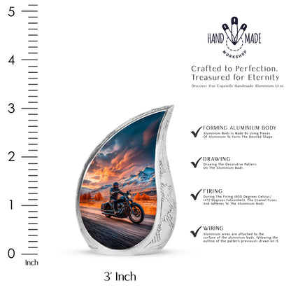 Deep Red Bike Cremation Urn angled view of lid and engraved motif - flowing teardrop bike silhouette on curved aluminum - mini keepsake memorial for portion of cremation ashes