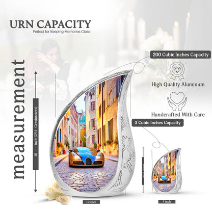 Celestial Blue Car Cremation Urn angled view of lid and engraved motif - rounded teardrop car design with delicate detail - mini keepsake memorial for portion of cremation ashes