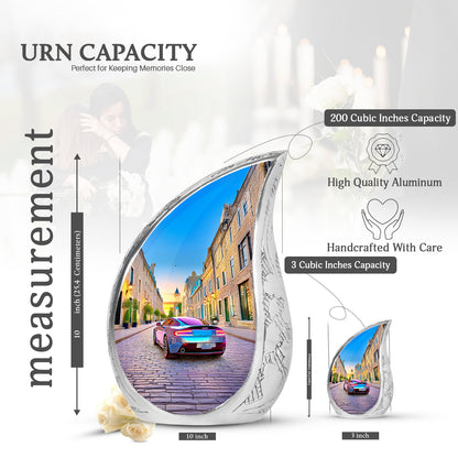 Sapphire Blue Car Cremation Urn angled view of lid and engraved motif - smooth teardrop contour featuring car art - mini keepsake memorial for portion of cremation ashes