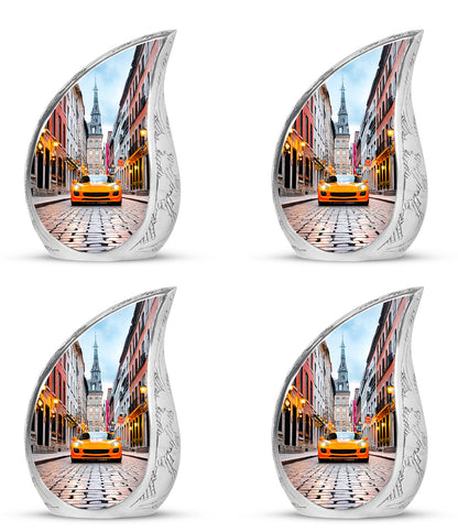 Ivory White Car Cremation Urn close-up of engraving and surface detail - rounded teardrop car design with delicate detail - 10 inch aluminum urn for cremated remains