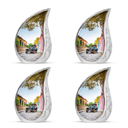 Porcelain White Car Cremation Urn close-up of engraving and surface detail - smooth teardrop contour featuring car art - 10 inch aluminum urn for cremated remains
