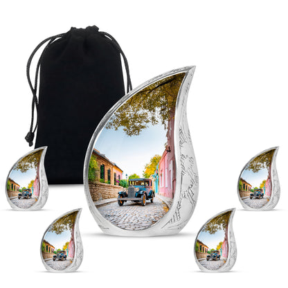 Cloud White Car Cremation Urn side profile showing urn shape - smooth teardrop contour featuring car art - memorial set with one large and four small urns